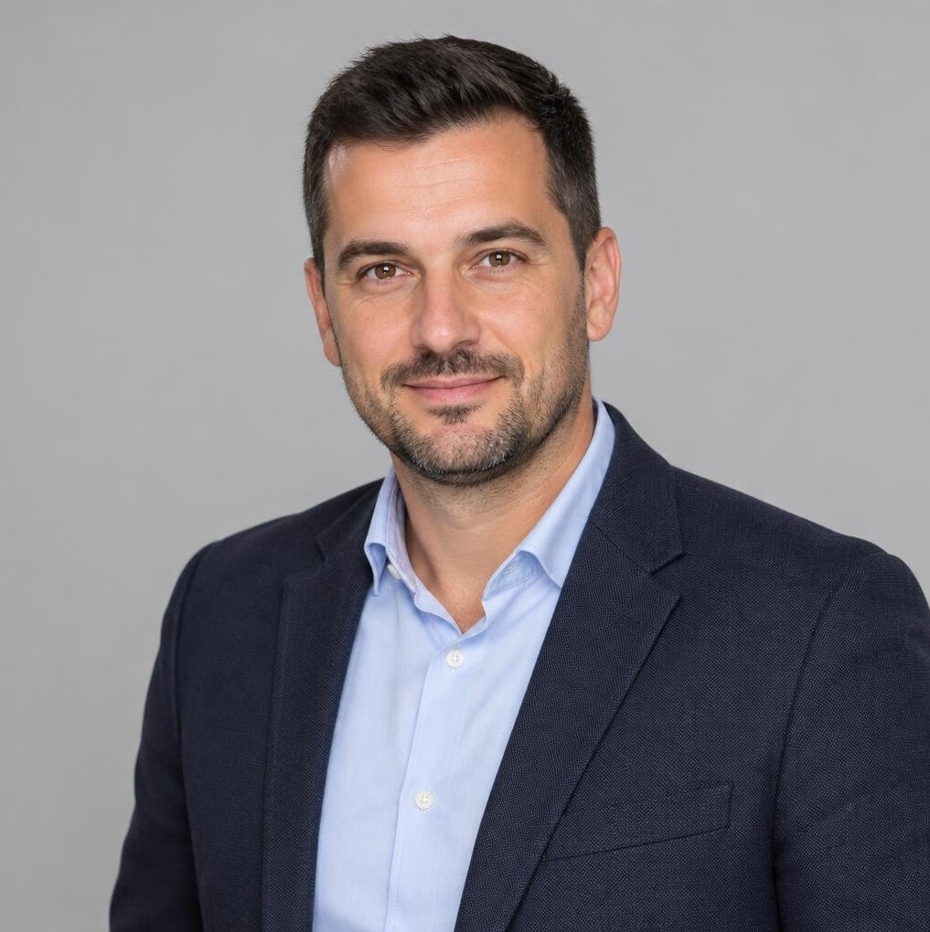 Studio portrait of a Croatian man editorial team member